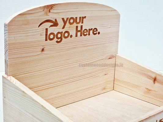 Countertop display unit from Custom Wood Designs with wooden finish and multiple compartments for product presentation.