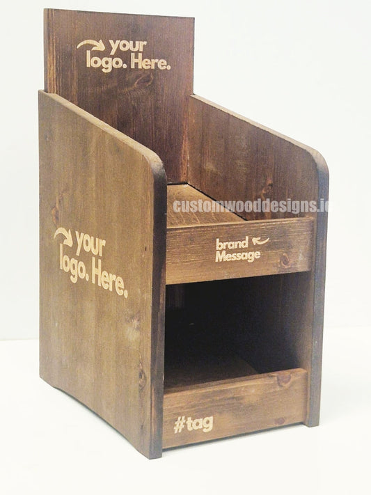 Dark pine two-tier countertop display by Custom Wood Designs, showing a compact wooden display for retail or presentation use.