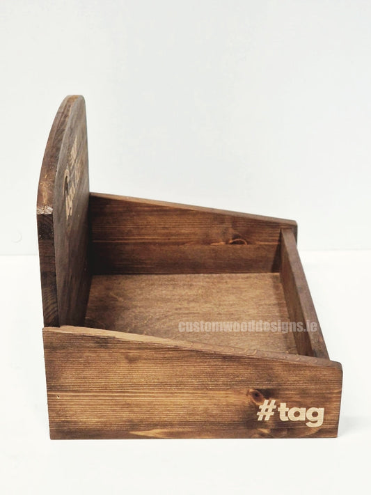 Wooden countertop display unit with open shelves by Custom Wood Designs, showing multiple compartments for product display.