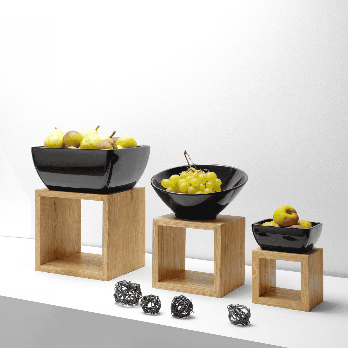 Fine Dine Madeira black stand, 220x220x220 mm, with a sleek design and sturdy construction for display or support.