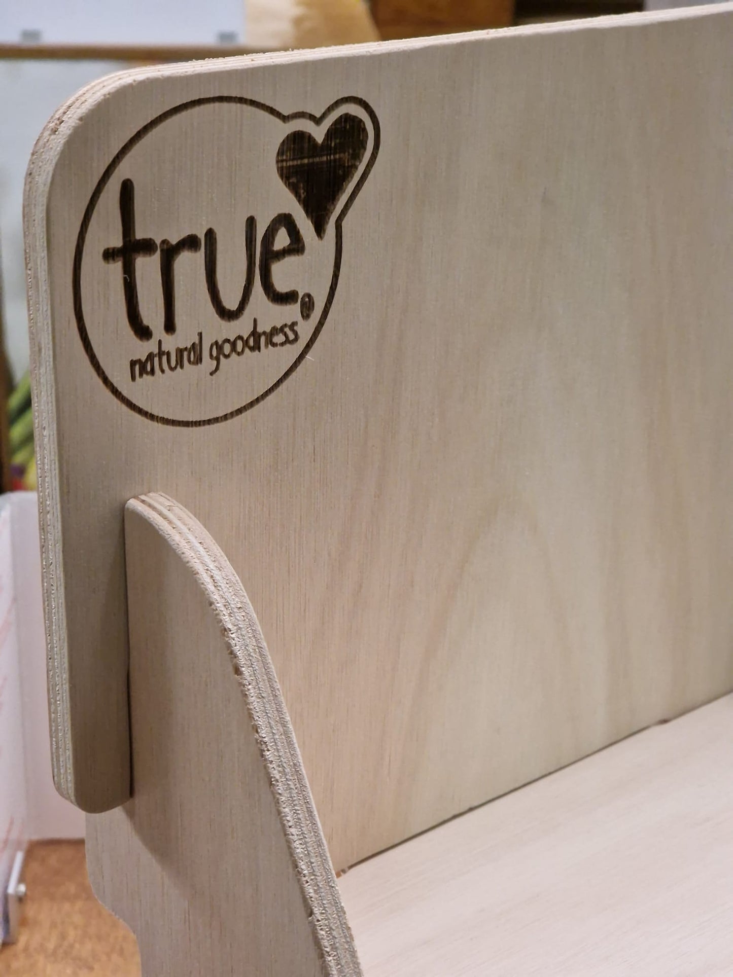 Esposit Levia countertop display unit in flat pack wooden retail slot-in design, ideal for showcasing products.