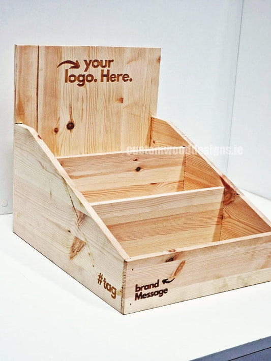 Natural pine low-tiered countertop display by Custom Wood Designs, showing a rustic wooden display stand with multiple tiers.