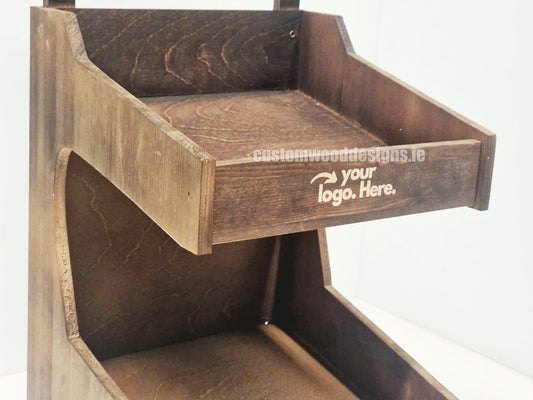 Dark pine two-tiered countertop display for baked goods by Custom Wood Designs, showing a sturdy wooden bakery display with multiple levels.