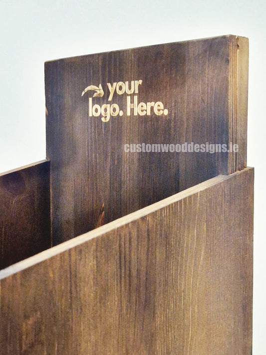Dark pine four-shelf countertop display by Custom Wood Designs showing a compact wooden retail display unit with shelves.