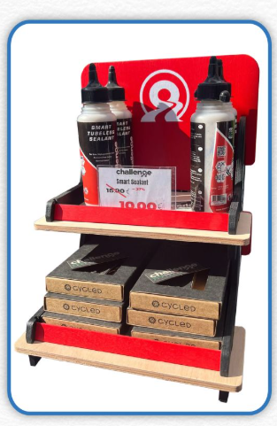 Red Levia countertop display by Esposit with a slot-in design for showcasing products on a retail counter.