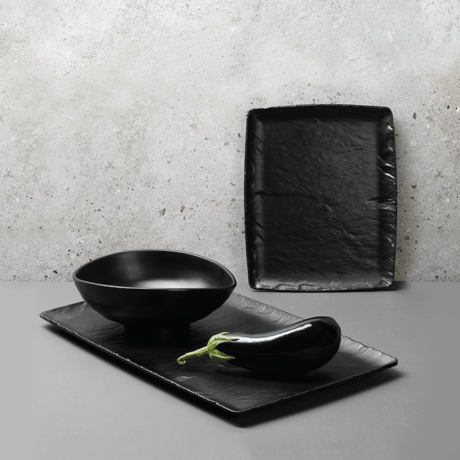 Black Polaris Platter GN 1/2, 265x325 mm serving platter by Fine Dine, showcasing a sleek rectangular design perfect for serving dishes.