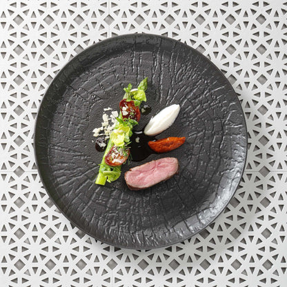 Rectangular plate by Fine Dine, 335x205mm, with a smooth ceramic surface and elegant design for serving food.